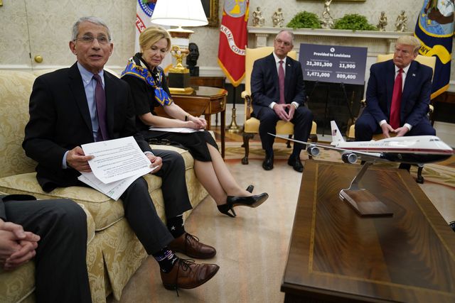 From left, Director of the National Institute of Allergy and Infectious Diseases Dr. Anthony Fauci, speaks as White House coronavirus response coordinator Dr. Deborah Birx, Louisiana Gov. John Bel Edwards, and and President Donald Trump listen as listen during a meeting about the coronavirus in the Oval Office of the White House, in Washington on April 28, 2020